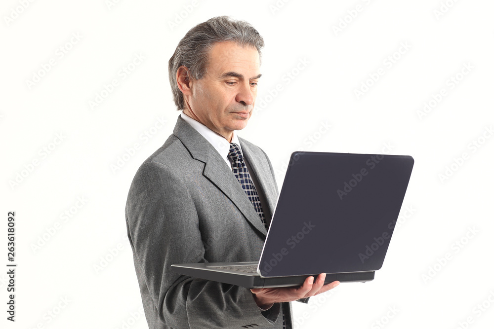 close up.adult businessman looking at laptop screen.isolated on white background close up.adult businessman looking at laptop screen.isolated on white background