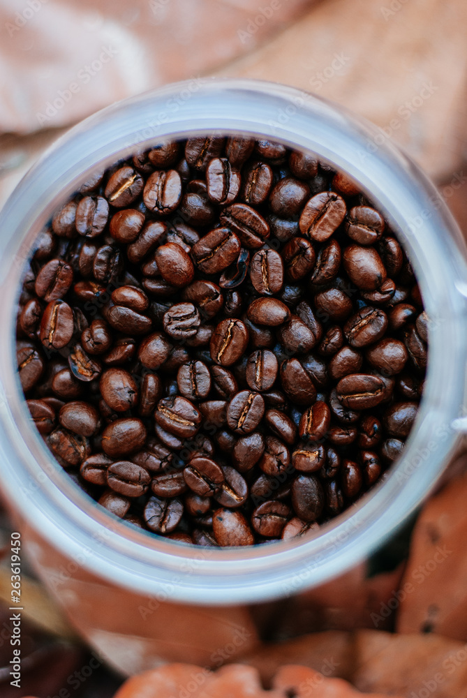 Fototapeta premium Roasted coffee bean in Nice Glass Jar
