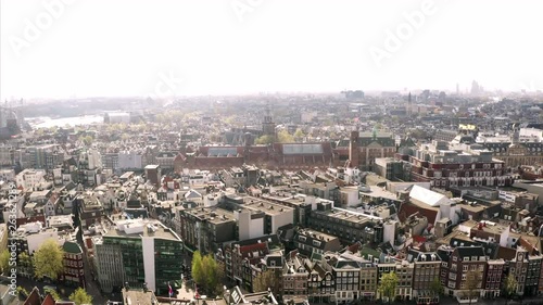 Wallpaper Mural Rising into the sky of Amsterdam, Netherlands. The dutch architecture and canals can be seen from above including major sights. Torontodigital.ca