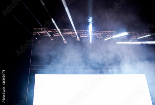 empty white board with copy space and stage lights - banner for music festival