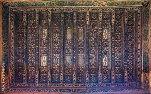 Wooden ceiling decorated with floral pattern decorations at ottoman historic Beit El Set Waseela building (Waseela Hanem House), Old Cairo, Egypt photo