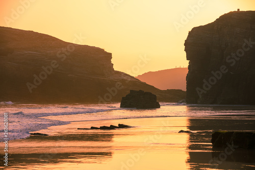 Rocky sea coast at sunrise. Playa de Las Catedrales  Ribadeo  Spain  Europe