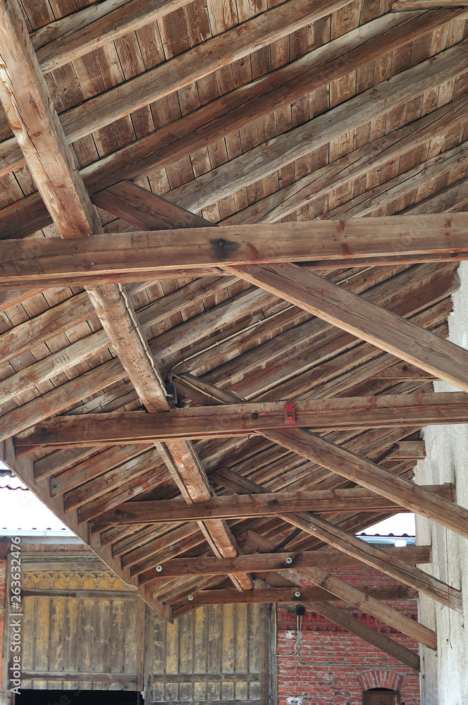 woodwork of projecting roof of an old farmhouse woodwork of projecting roof of an old farmhouse
