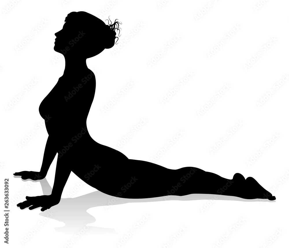 A silhouette of a woman in a yoga or pilates pose A silhouette of a woman in a yoga or pilates pose