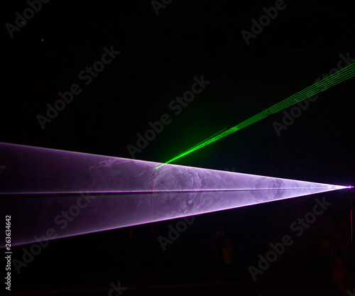 futuristic lights. Cyberpunk background. Abstract lasers  glowing lines  neon lights  abstract psychedelic background  ultraviolet  pink blue green vibrant colors