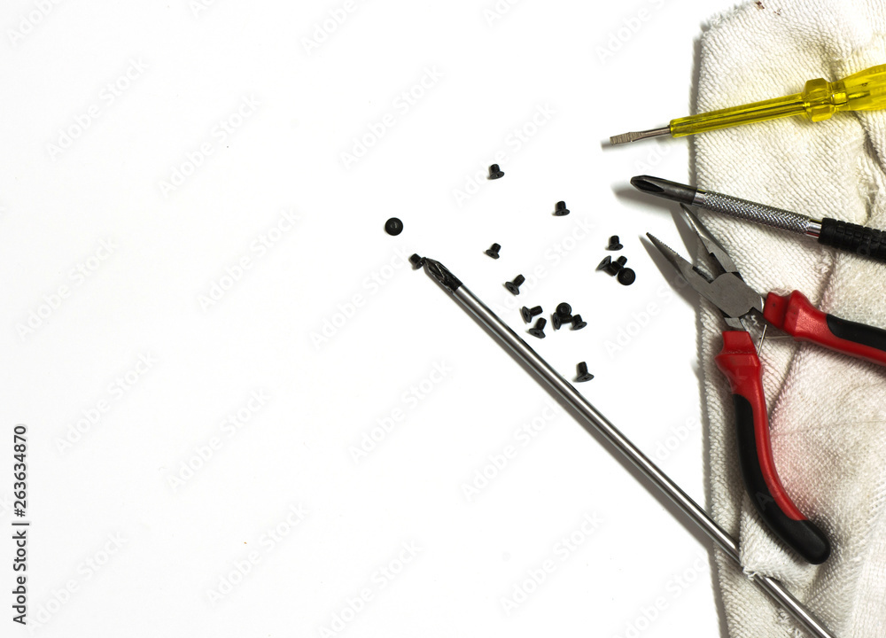 Screwdriver,pliers and other on white background with copy space. Screwdriver,pliers and other on white background with copy space.