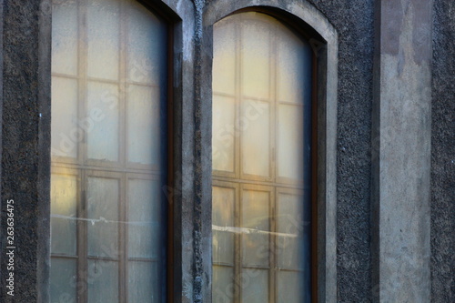 old winodws with plastic sheet over