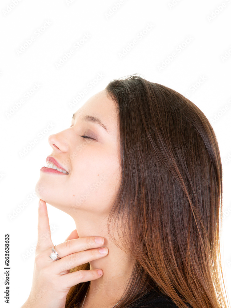 beautiful young woman face profile hand on chin over white background beautiful young woman face profile hand on chin over white background