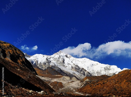 Mount Kanchenjunga And Floating Clouds