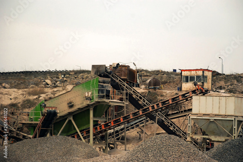 Stone pit quarry with conveyors and rock crackers