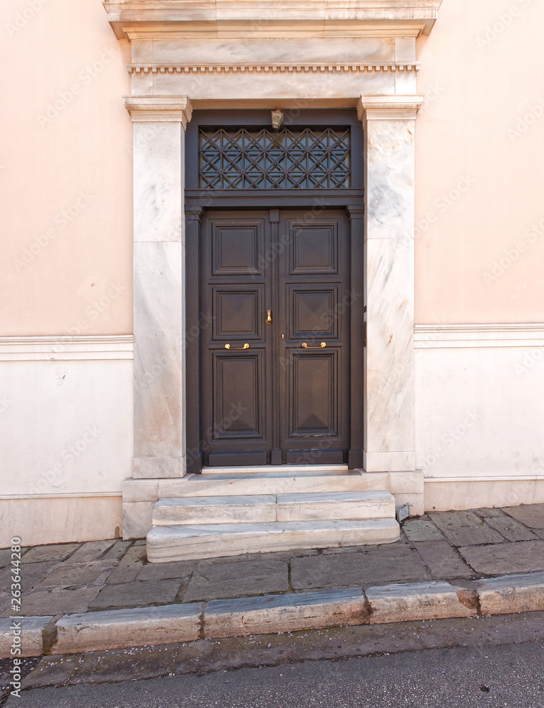 classical house entrance brown wooden door, Athens downtown, Greece classical house entrance brown wooden door, Athens downtown, Greece