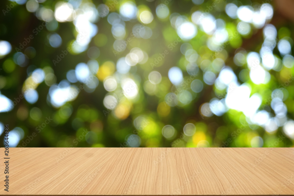 Empty dark wooden table in front of abstract blurred bokeh background of restaurant . can be used for display or montage your products.Mock up for space. Empty dark wooden table in front of abstract blurred bokeh background of restaurant . can be used for display or montage your products.Mock up for space.
