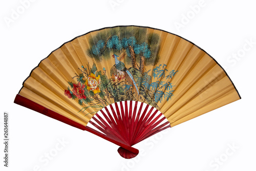 Large yellow wooden Chinese fan, weaved on white background, isolate