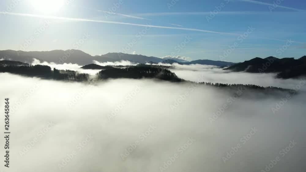 Aerial view of mountains with a breathtaking sea of fog Aerial view of mountains with a breathtaking sea of fog