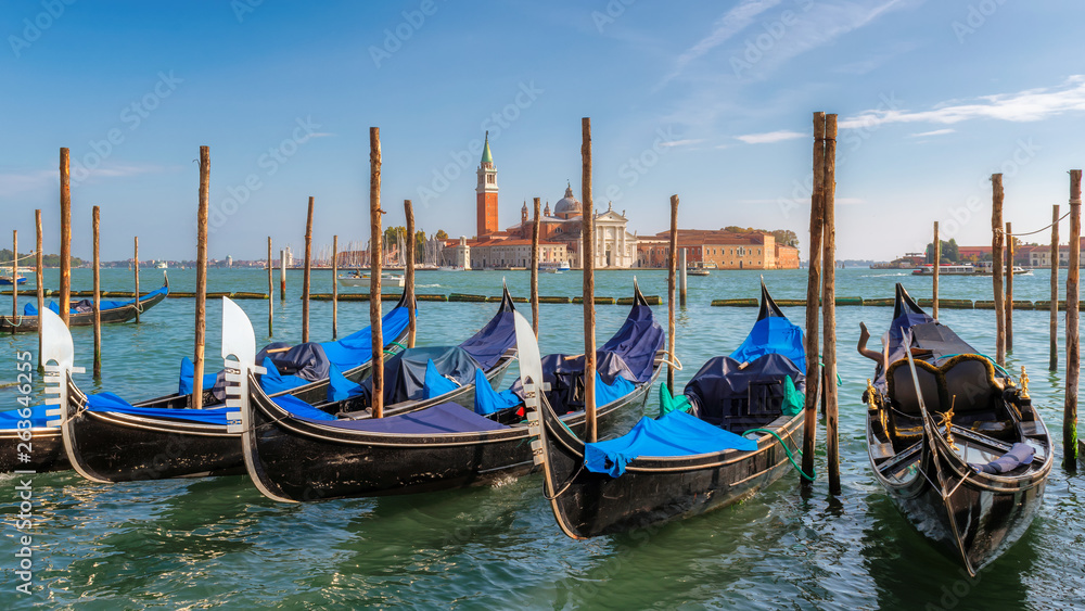 Venice gondolas at sunny day on San Marco square, Venice, Italy.