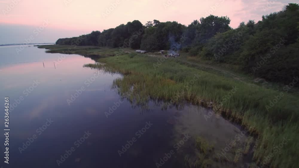 Campfire near the sea in beautiful Denmark. Drone shot Campfire near the sea in beautiful Denmark. Drone shot