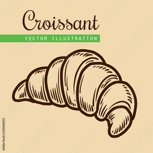 croissant on beige background