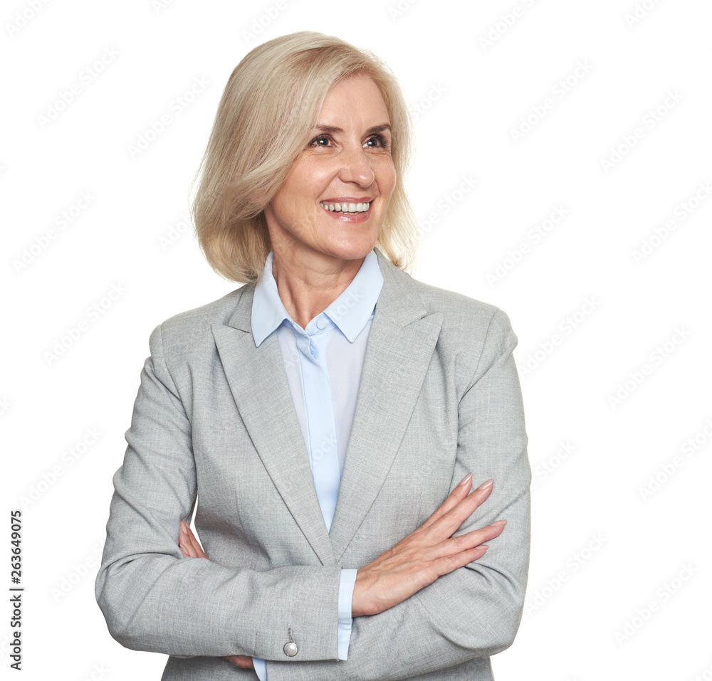 Happy senior business woman looking away. Isolated on white
