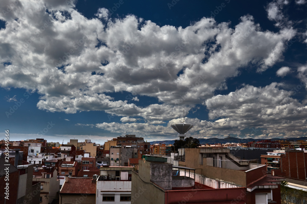 Fototapeta premium City and sky with clouds