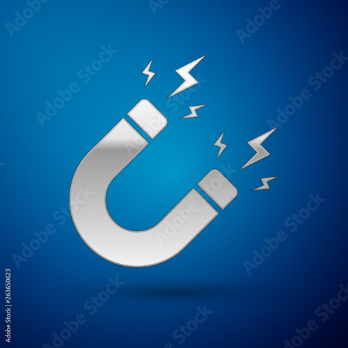 Silver Magnet with lightning icon isolated on blue background. Horseshoe magnet, magnetism, magnetize, attraction sign. Vector Illustration