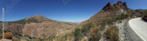 Panoramic view rocky moutain with road and nature.