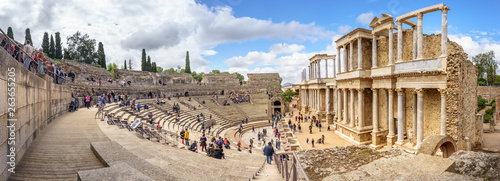 Merida, Spain. April 2019: Tourist crowd in the Antique Roman Theatre in Merida. Panorama image. The Archaeological Ensemble of Merida is declared a UNESCO World Heritage Site Ref 664