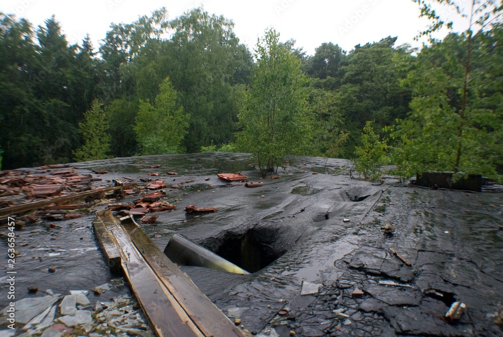 Destroyed roof of an abandoned building Destroyed roof of an abandoned building