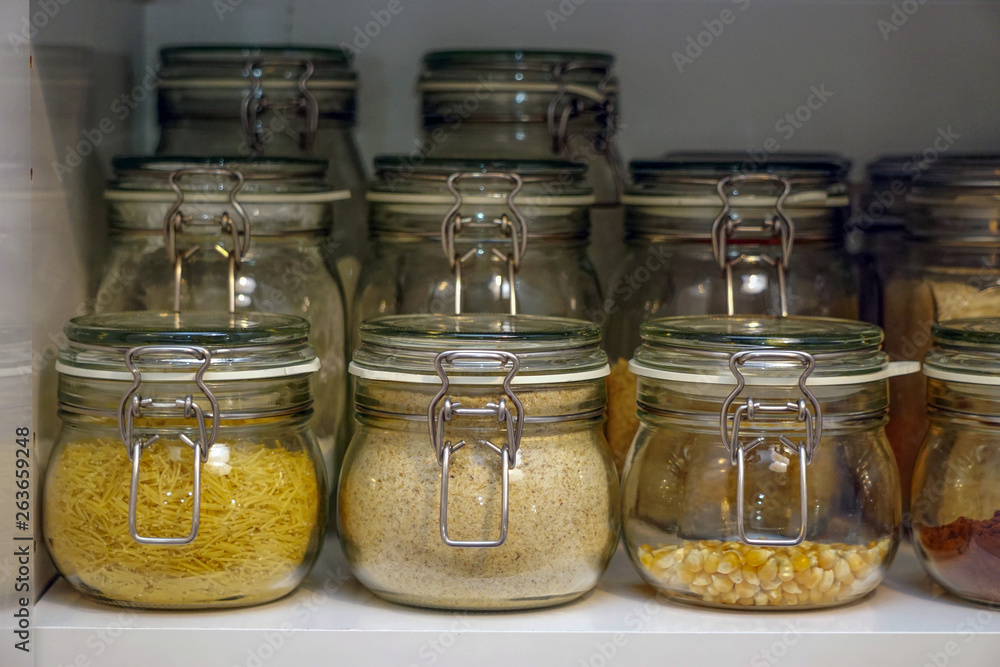 Pulses jars in the kitchen drawer arranged neatly close up view Pulses jars in the kitchen drawer arranged neatly close up view