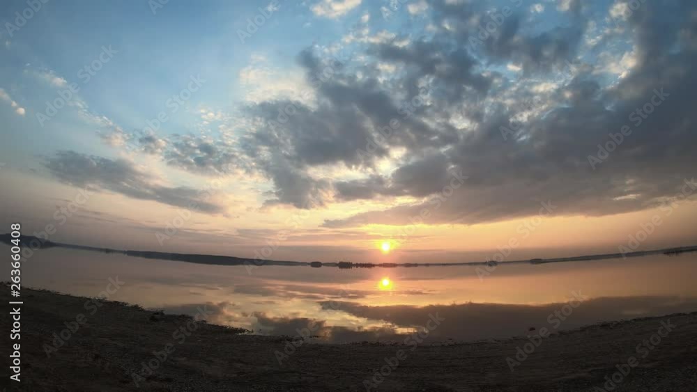 Timelapse sunset on the lake. Evening sunset on the river. Timelapse sunset on the lake. Evening sunset on the river.