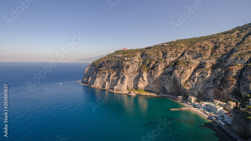 View of the Sorrento coast. Meta beach, travel concept, space for text, bay with boats, Italia mountains, travel concept