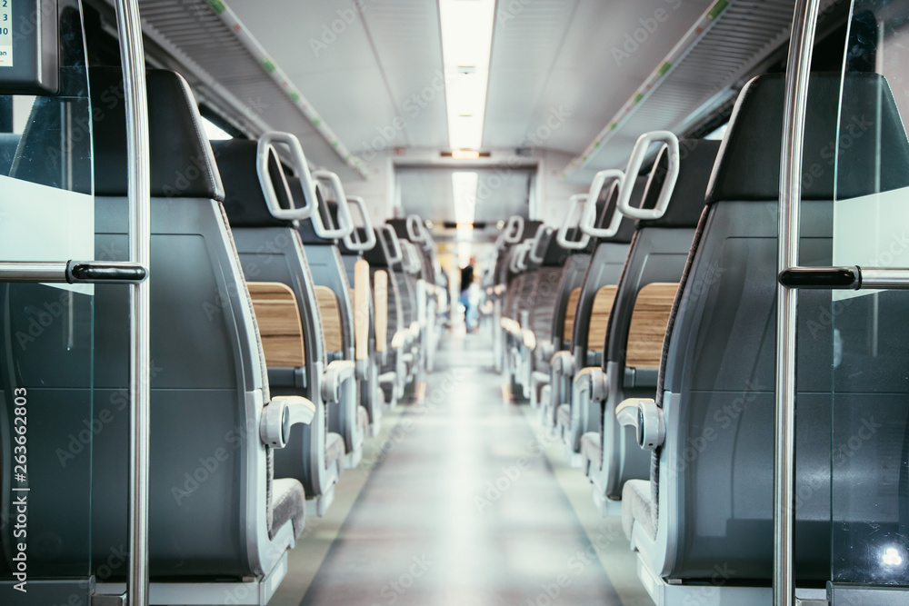 Obraz premium Interior of a public transport train, empty seats