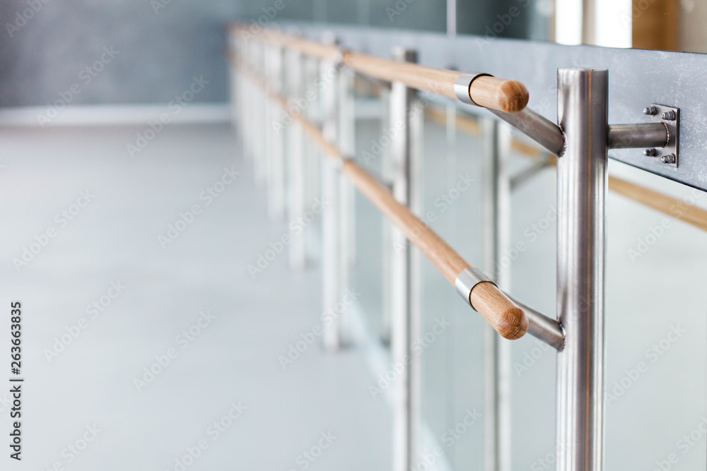 Ballet wooden barre by mirror in dance class room. Blurred background of  ballet modern school. Stock Photo | Adobe Stock