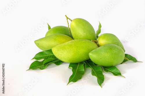 Green mango in a white background.