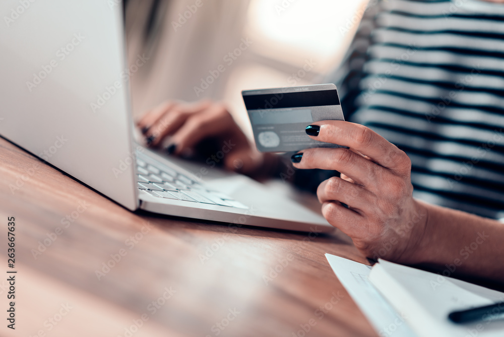 Woman using credit card Woman using credit card
