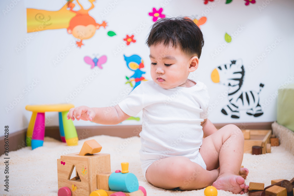 Child boy building playing toy blocks wood Child boy building playing toy blocks wood