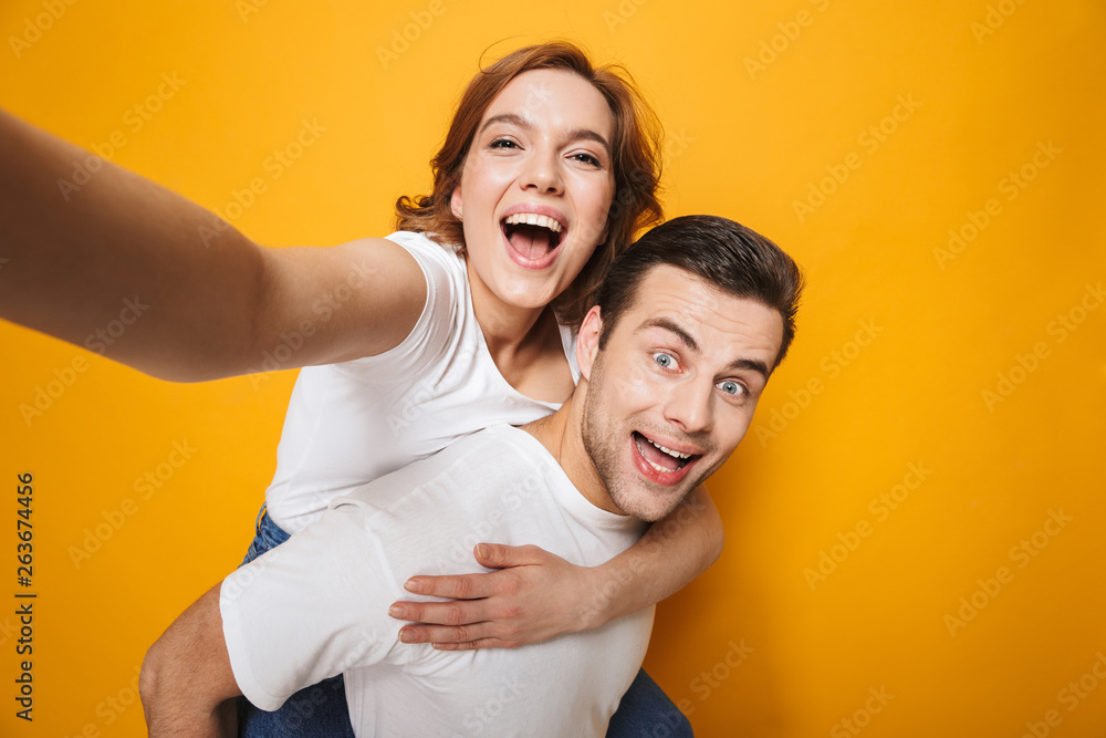 Portrait of a cheerful young couple standing Portrait of a cheerful young couple standing