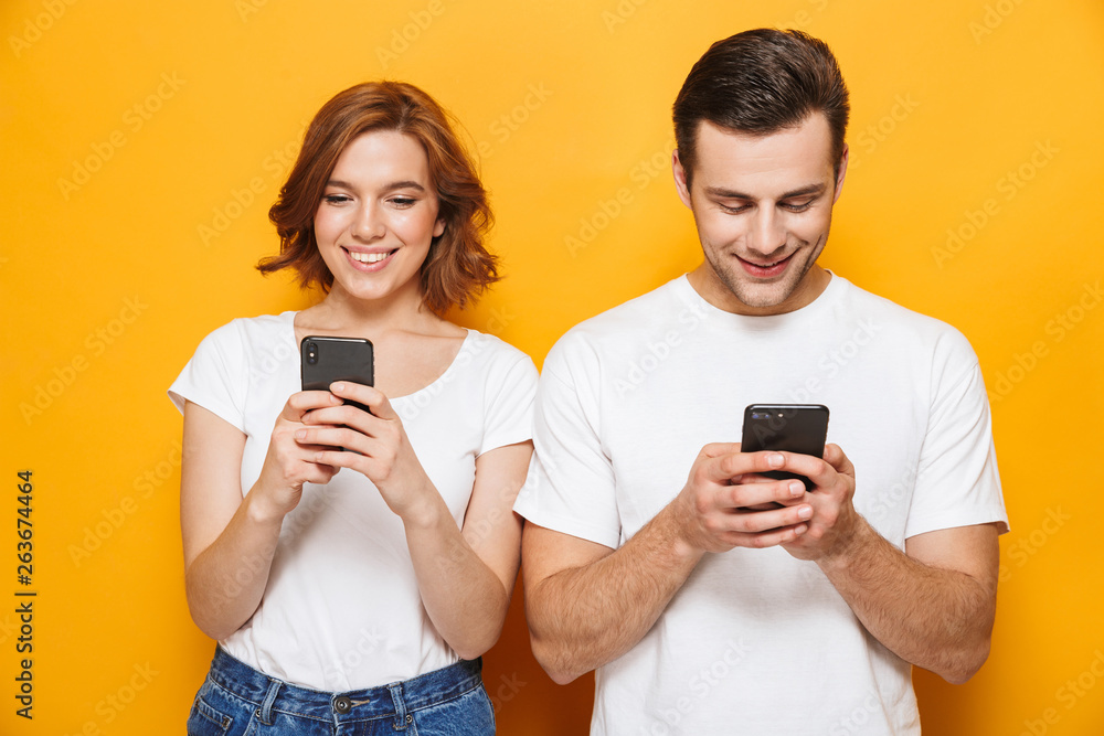 Portrait of a cheerful young couple standing