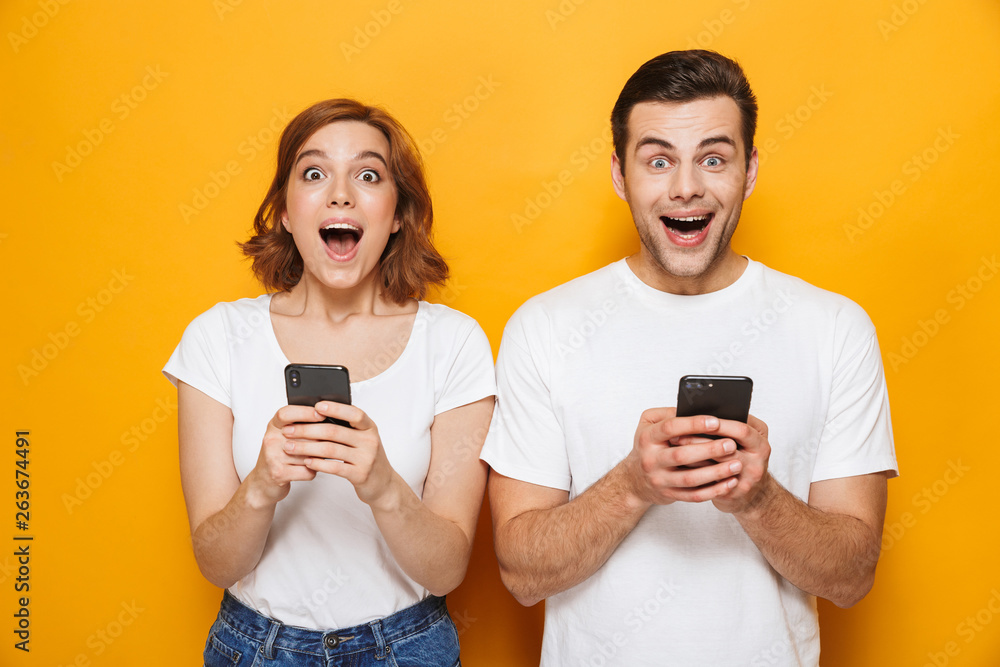 Portrait of a cheerful young couple standing Portrait of a cheerful young couple standing