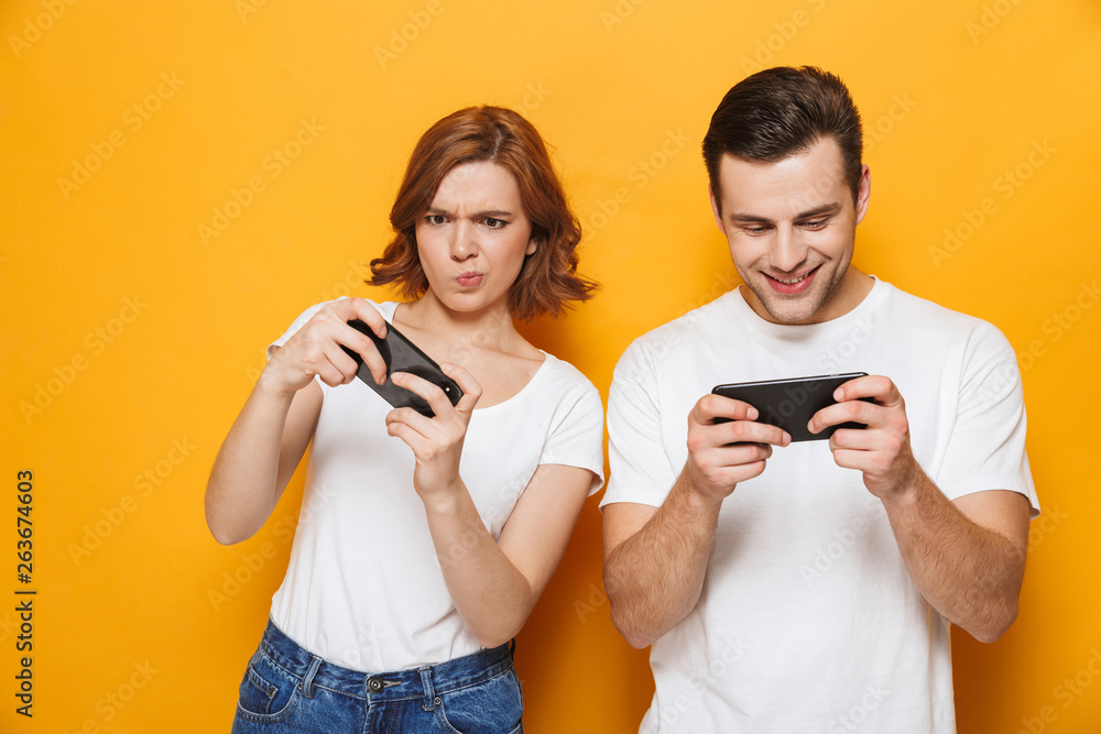 Portrait of a cheerful young couple standing Portrait of a cheerful young couple standing