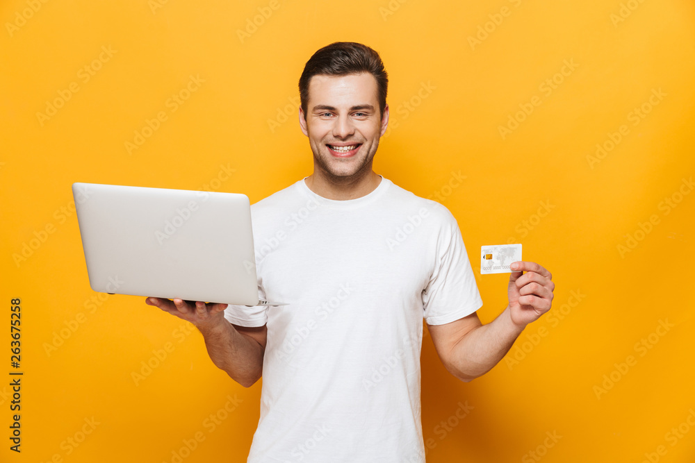 Portrait of a happy handsome man wearing t-shirt Portrait of a happy handsome man wearing t-shirt
