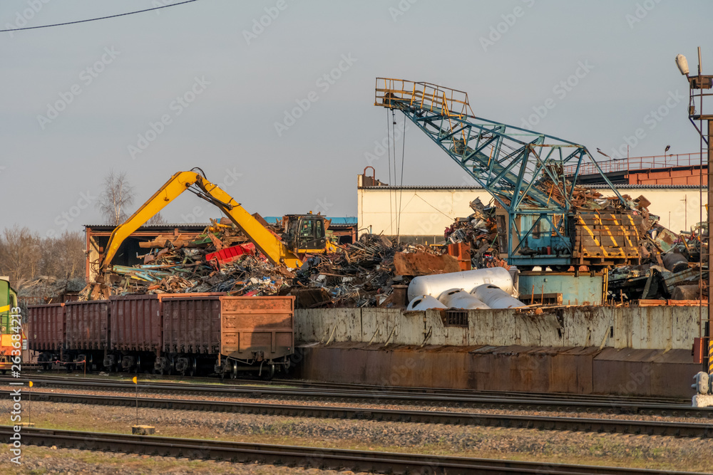crane grab loading scrap metal. industry concept. Delivery of scrap metal