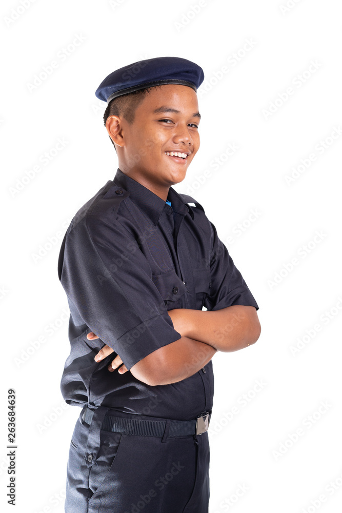 Young Asian man in policeman officer outfit isolated on white background. Copy space. Young Asian man in policeman officer outfit isolated on white background. Copy space.