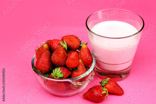 Fresh ripe juicy Strawberry with a glass of strawberry milkshake