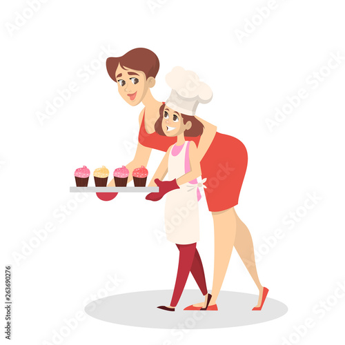 Mother and daughter in apron cooking at home