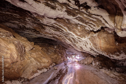 Trails of flashlights deep in the Narmakdan Salt Cave at Qeshm Island, Iran