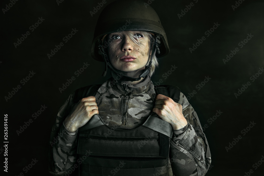 Portrait of young female soldier