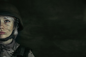 Portrait of young female soldier