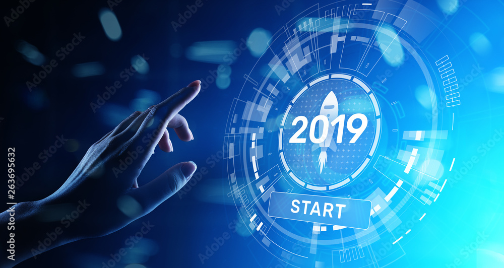 New year 2019 start button on virtual screen hologram. FInancial growth and new perspective in business and life.