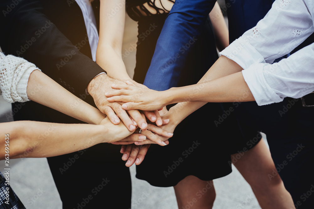 Group Many business people join hands to demonstrate harmony. The determination to work successfully achieved the goal. Work together. Group Many business people join hands to demonstrate harmony. The determination to work successfully achieved the goal. Work together.