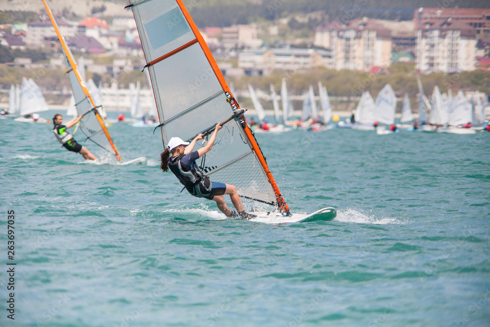 Naklejka premium windsurfing in sea